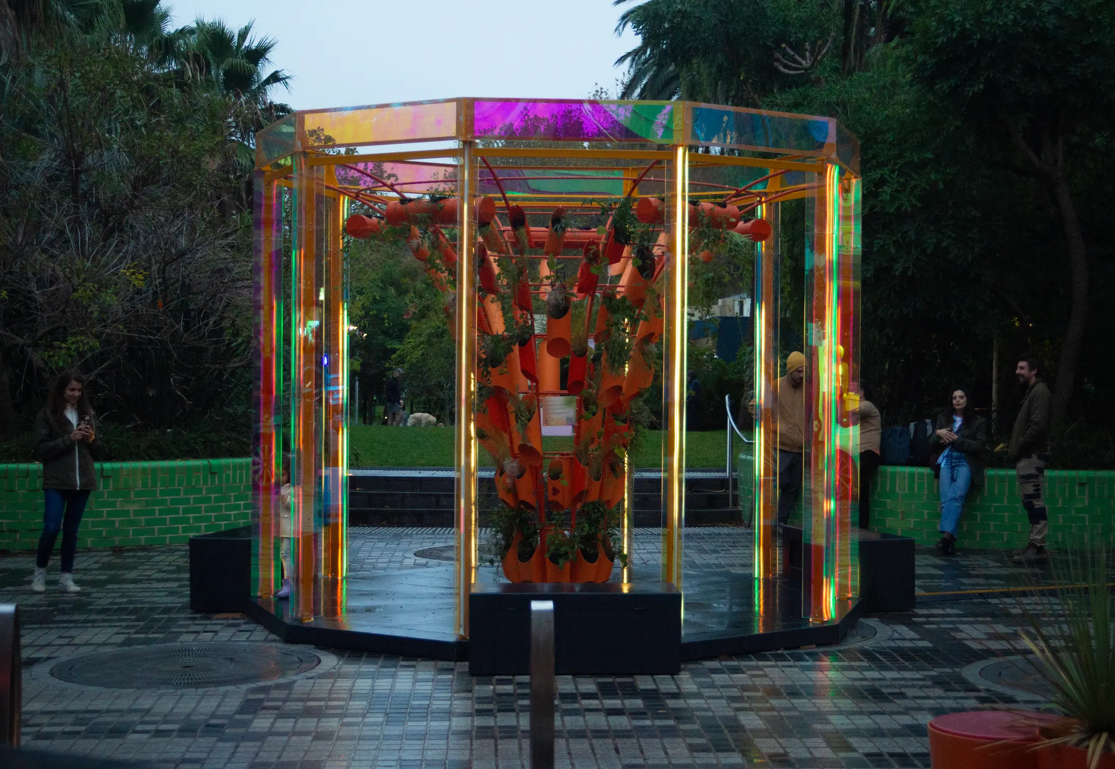 Visitors gathered around the sculpture at the soft launch