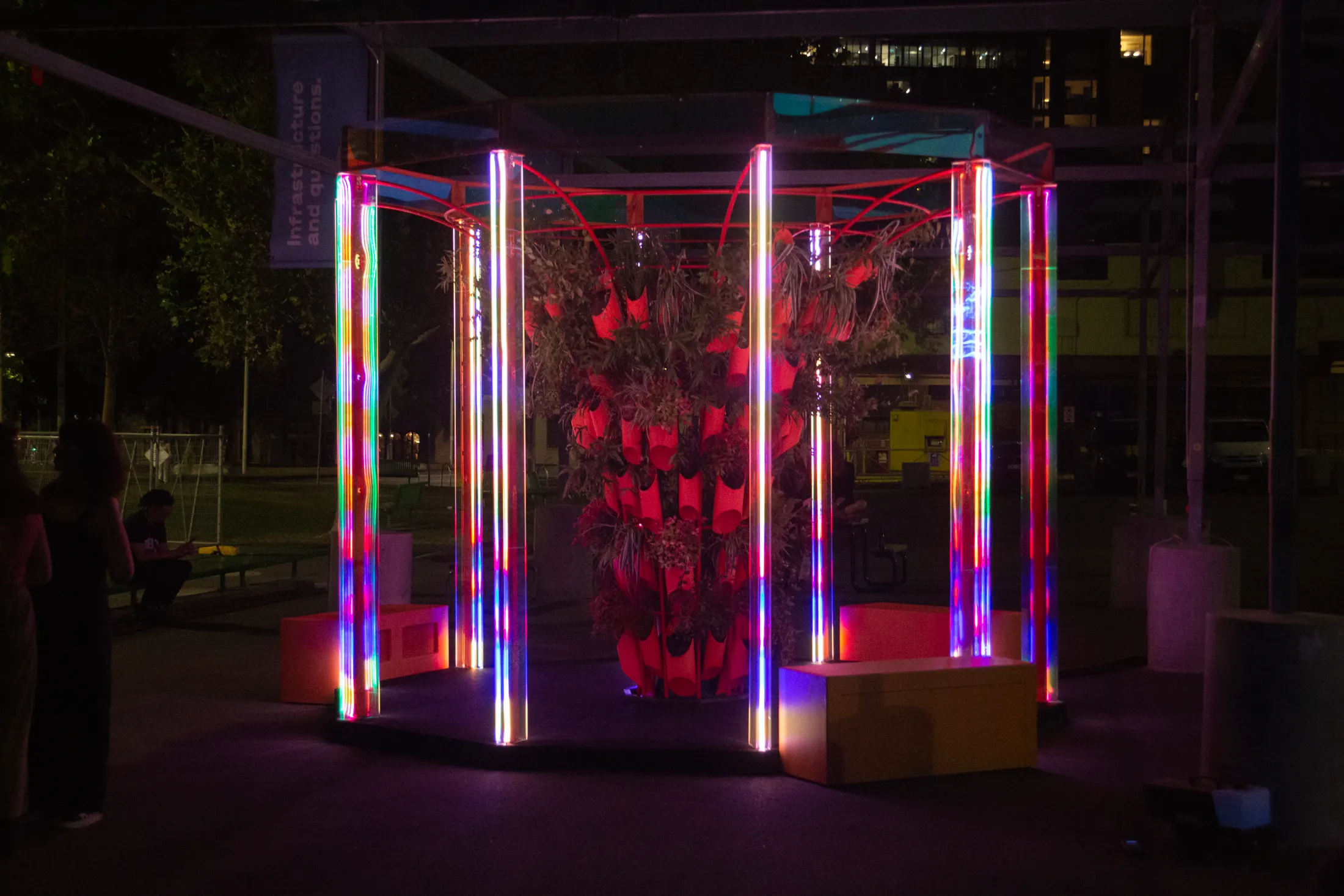 BioRhythm at night, LED columns glowing magenta and blue