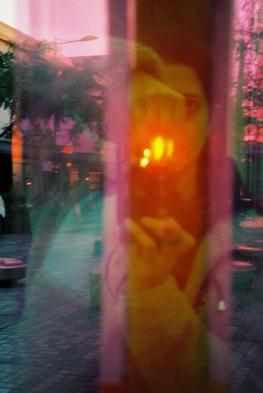35mm photo: blurred orange and pink light