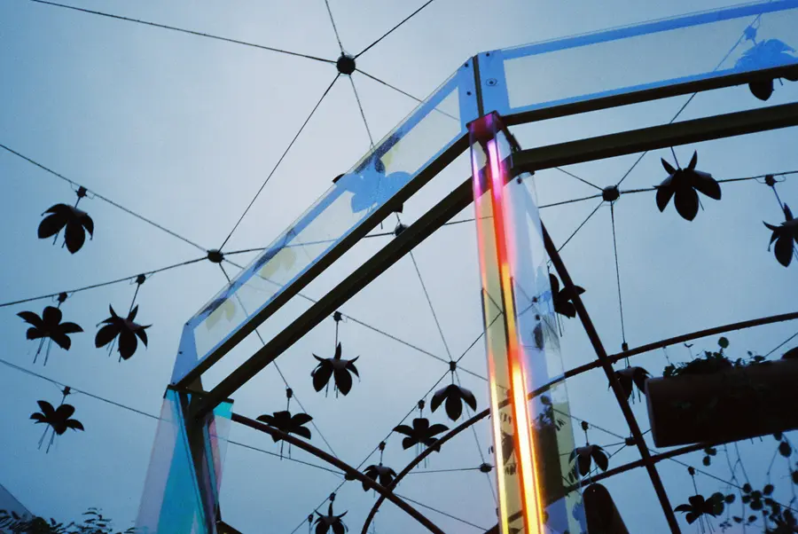 35mm photo: frame and leaf-shaped lanterns against the sky
